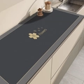 Tappetino da cucina in diatomite grigio scuro con elegante motivo floreale dorato - Fiore su sfondo grigio