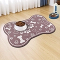Detail of bone-shaped pet feeding mat with paw prints and stainless steel bowl - 30*40cm / Bone Shape / Coffee Purple (Dog Mat-22)
