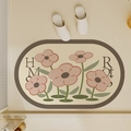 Dettaglio del tappeto da bagno ovale in diatomite con motivi floreali rosa e bordo - 40*60cm / Fiore Crema Vitalità - Rosa Verde (Nuovo Stile)