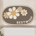Dettaglio tappeto ovale in terra di diatomee con margherite gialle e testo Bestwish bagno - 40*60cm / Girasole Grande