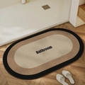Detail of oval absorbent bathroom mat with woven linen texture and non-slip backing - 40*60cm (Skin-friendly Velvet) / Oatmeal