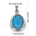 Gedetailleerde weergave van de druppelvormige turquoise hanger met zilveren rand en maten - Druppelvorm Blauw Turkoois (YSN236-09)