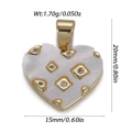 Macro shot of 20mm heart pendant with white mother of pearl inlay and crystal stones - Golden Heart MOP Micro-Inlaid Style (YSN239-07)