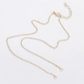 Close-up of gold-plated chain with lobster clasp and extender for DIY jewelry making - Golden Cross Chain Accessory
