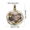 Two-tone celestial star and moon charm pendant with black shell inlay and sparkling crystals - Golden Star Moon Black MOP Pendant (YSN239-05)