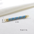 Macro detail of 6cm blue enamel cylinder bead with spiral texture and crystal inlays - Light Blue Spiral Connector (13)