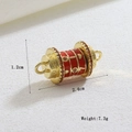 Macro detail of luxury prayer wheel pendant with red enamel heart and orange gems - Red LOVE Connector (09)