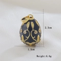 Detail view of 18k gold plated egg pendant with dimensions 2.3cm by 1.5cm and 6.6g weight - Black (03)