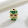 Macro detail of geometric barrel charm with green enamel and red marquise stones - Green Striped Drum (01)