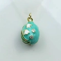 Detail of Fabergé style mint green enamel egg pendant with lily of the valley and zircon - Mint Green Lily (14)