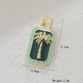 Detailed macro view of an 18k gold-plated rectangular enamel pendant with palm tree - Gold Palm Tree (01)