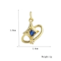 Macro shot of gold planet pendant with blue square stone and white zircon details - Orbit Planet Saturn Style (14)
