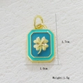 Macro view of 18k gold-plated clover pendant showing dimensions 1.7cm by 1.0cm - Blue Clover (09)