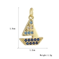 Detailed macro view of a gold-plated sailboat pendant with blue and white stones - Blue White Stone Sailboat Style (12)
