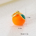 Detailed view of orange fruit charm showing dimensions 1.1x0.9cm and 2.9g weight - Orange (01)