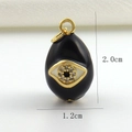 Detail of 2.0cm x 1.2cm enamel evil eye egg pendant in gold finish with size markers - Black Enamel Evil Eye Style (04)