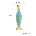 Macro detail of 18k gold plated fish pendant with blue enamel and yellow wavy lines - Blue Fish Style