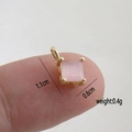 Detail showing pink zircon square pendant in gold plating with dimensions 1.1cm x 0.8cm - Pink Square Cat's Eye Stone Pendant