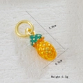 Detail showing 1.6cm 18k gold-plated pineapple charm with vibrant yellow and green enamel - Yellow Pineapple