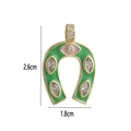 Detailed size view of a 2.6cm emerald horseshoe pendant with pink evil eye charm - Green Horseshoe Style