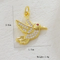 Detailed view of a gold hummingbird pendant with white rhinestones measuring 2.0x1.7cm - White Micro-Pave Hummingbird Style