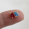 Detail of mini square and pear-shaped colorful zircon pendant with 18k gold plating - Dark Red Rectangle & Blue Tear Drop