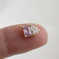 Close-up of a 18k gold pendant with rectangular purple and teardrop zircon stones - Purple Rectangle & Clear White Tear Drop