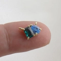 Close-up of a mini 18k gold-plated connector with green square and blue waterdrop zircons - Green Rectangle & Blue Tear Drop