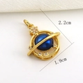 Detail of gold Saturn pendant with blue opal pearl and zircon stones, 2.2cm x 1.9cm - Blue Pearlescent Saturn Style (06)