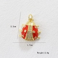 Macro detail of 18k gold plated ladybug charm with red enamel and zircon stones - Rhinestone Ladybug (02)