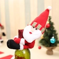 Festive Santa Claus wine bottle cover with red hat and white beard for Christmas table decor - Santa Claus Style