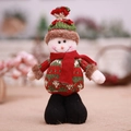 Standing Christmas snowman plush doll with green knit hat and festive red scarf - Snowman