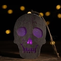 Wooden Halloween skull decoration with purple glowing lights and hanging jute rope - Skull Pattern