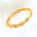 18k vergulde opengewerkte armband met turquoise zirkonia en fijn gegraveerde details - Goudgeel