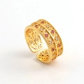 Close-up of gold-plated filigree open ring featuring red and white zircon accents - Red Zirconia Leaf Ring