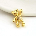Close-up of golden bear pendant with heart-shaped white zircon inlay and fine metal craftsmanship - Waving Bear Heart Style (10)