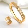 Detail of leaf-shaped gold plated jewelry set featuring zircon and turquoise stones - Turquoise Tree Leaf Ring