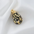 Detail of egg pendant with black enamel gold filigree and inlaid zircon on silk - Black