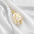 Fabergé-style egg pendant with white enamel finish and gold filigree vine details - White