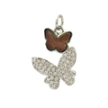 Detailed view of silver butterfly pendant featuring brown enamel and clear zircon stones - Brown