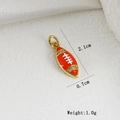 Macro shot of 2.1cm red enamel football charm with gold plating and rhinestones - Red Football (C)