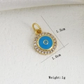Dettaglio ciondolo occhio blu da 1,5 cm in smalto con castone in zirconi lucidi - Malocchio Celeste (K)