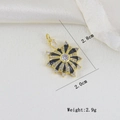 Dettagli dimensionali di un ciondolo a fiore in oro e smalto nero con zirconi cubici - Disegno Di Girasole In Smalto Nero (a)
