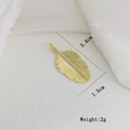 Detail of 3.4cm gold feather pendant with micro-inset zircons and mounting ring - Feather Style (D)