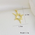 Detailed view of a gold starburst charm showing dimensions 2.7cm by 1.9cm and weight 1.2g - Radiant Star (D)