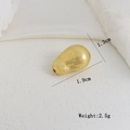 Close-up of golden teardrop DIY bead with brushed texture, dimensions 1.9cm by 1.3cm - Matte Teardrop Bead (K)