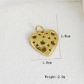 Macro detail of a 1.8cm gold hollow heart pendant with zircons for DIY jewelry - Hollow Round Hole Heart Style (P)