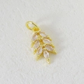 Detailed macro view of gold-plated wheat-shaped pendant with marquise zircon stones - Wheat Ear Shape (05)