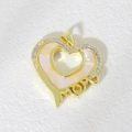 Macro view of gold heart pendant with white shell inlay, cubic zirconia and MOM text - Heart Nested MOM Style (08)