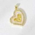 Macro detail of gold heart pendant with Mom engraving and white zircon inlay - Mother Of Pearl Lined Mom Heart Style (11)